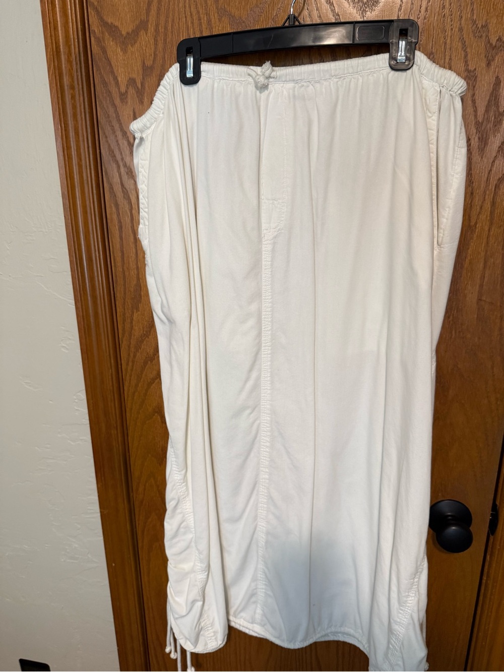 Free People White Midi Skirt with side ties on side at hem line.